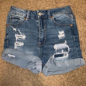 Distressed wax jean shorts